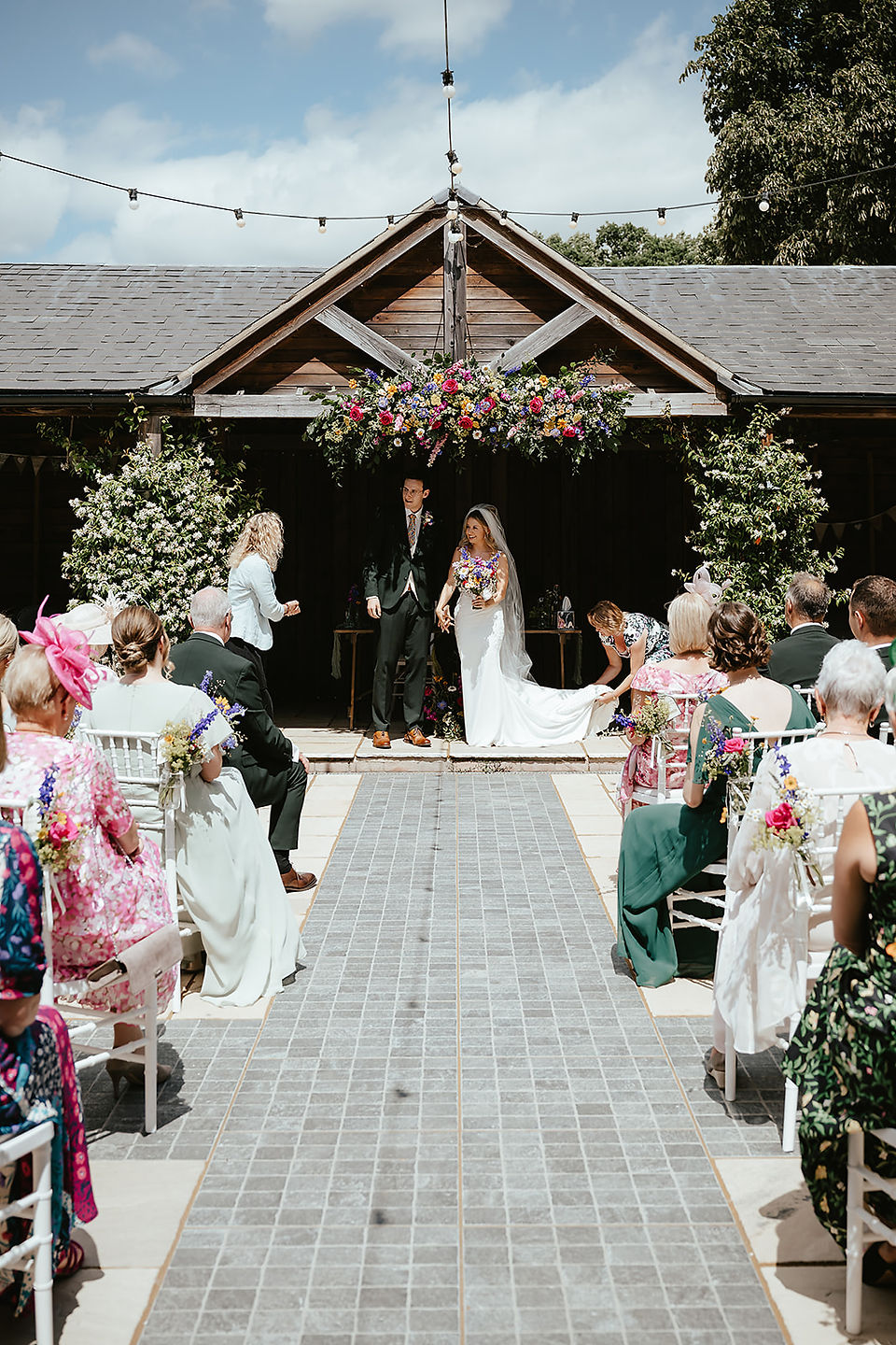 bride and groom walking down the the aisle