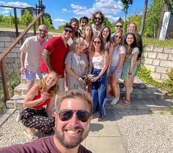 Travelers in Europe taking a group photo on an FTLO trip