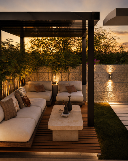 Luxury outdoor patio with sectional seating, reflecting water feature, and ambient landscape lighting.