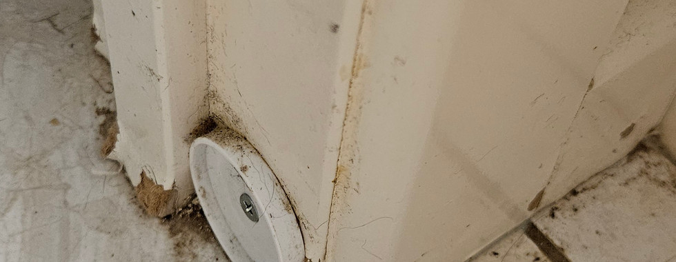 doorframe water damage from laundry to kitchen