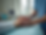 detail shot physiotherapist hands demonstrating technique patient therapeutic environment