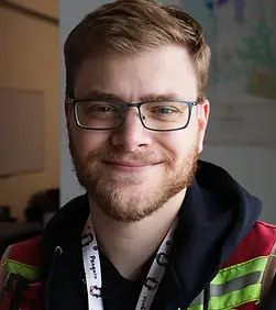 DarcyVis_Headshot-1440x1920.webp