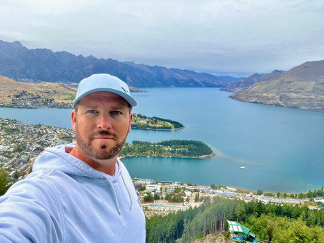 Mike Woods next to a lake