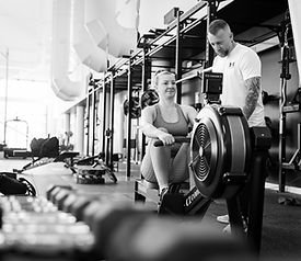 Coaching a client in a personal training session