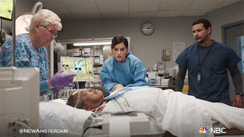 operating room nurse performing ACLS life support