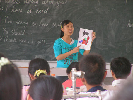 Teacher leading a classroom lesson in China