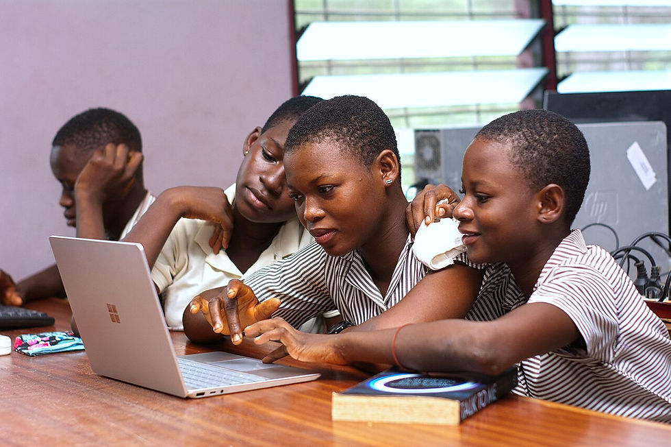 Students using a laptop during a learning activity