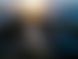 Sunset over marina and ocean, symbolizing calm and new beginnings.