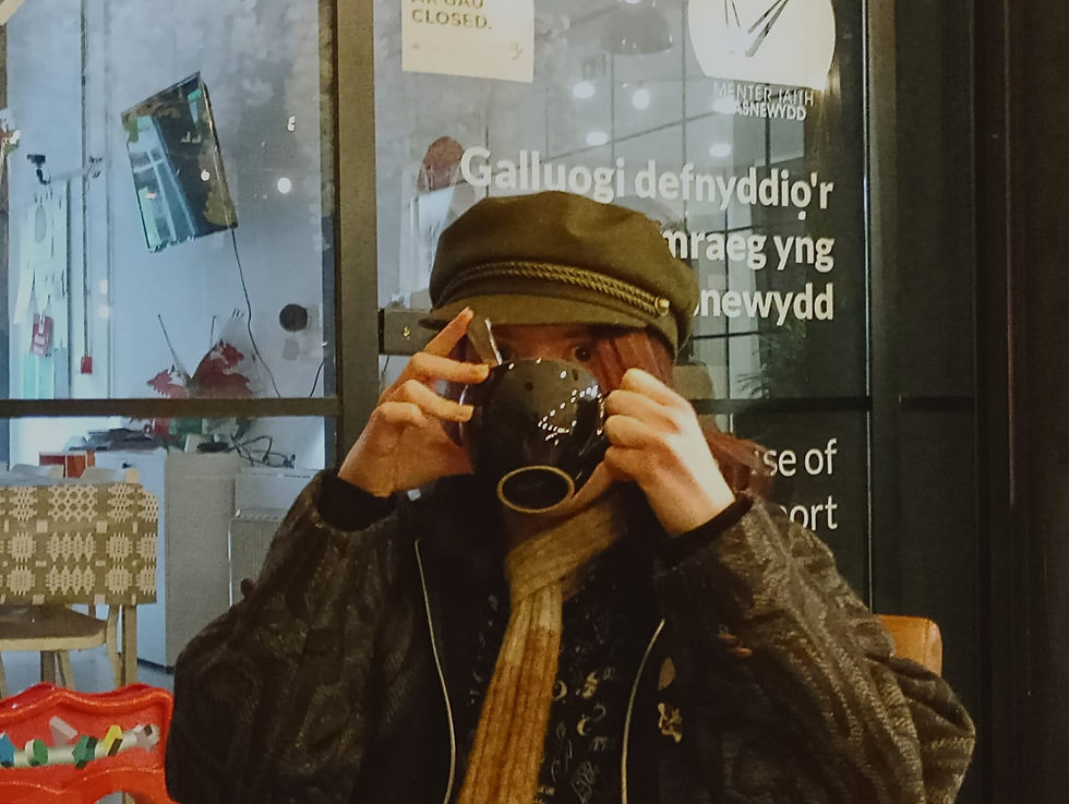 Emmy drinks hot chocolate like a madman