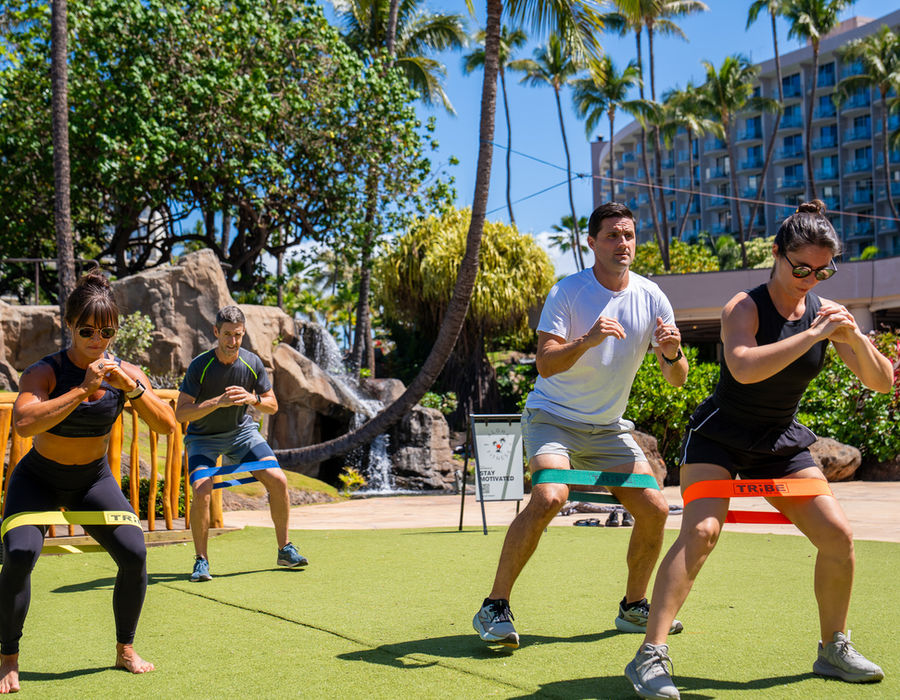 Guests training with resistance bands