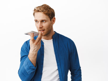 A person searching on his phone by using his voice search feature on his phone. This image is featured on the blog of the Jaseem, the best freelance digital marketing specialist in Kerala.