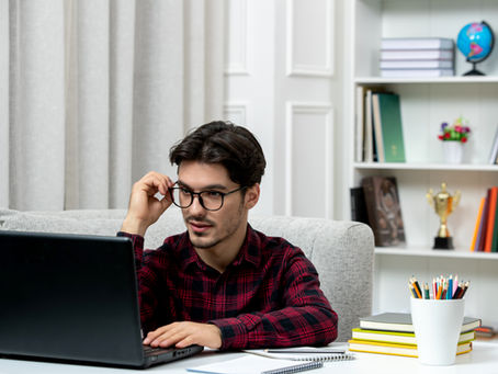 A person searching on his laptop, this image is featured on the blog of Jaseem, the best freelance digital marketing specialist in Kerala about the agentic web and how ai agents reshaping the future of the internet