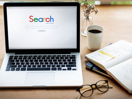 An image of google search home along with cup of coffee and a book this featured on the blog of Jaseem, the best freelance digital marketing specialist in Kerala about common google ads mistakes businesses make