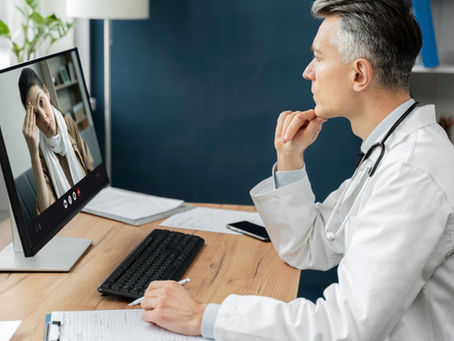 An image of a doctor consulting with his patient virtually is featured on the blog "Why SEO is the New Front Door of Healthcare in 2026."