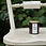 Thumbnail: Winterfold candle on a cream chair outside 
