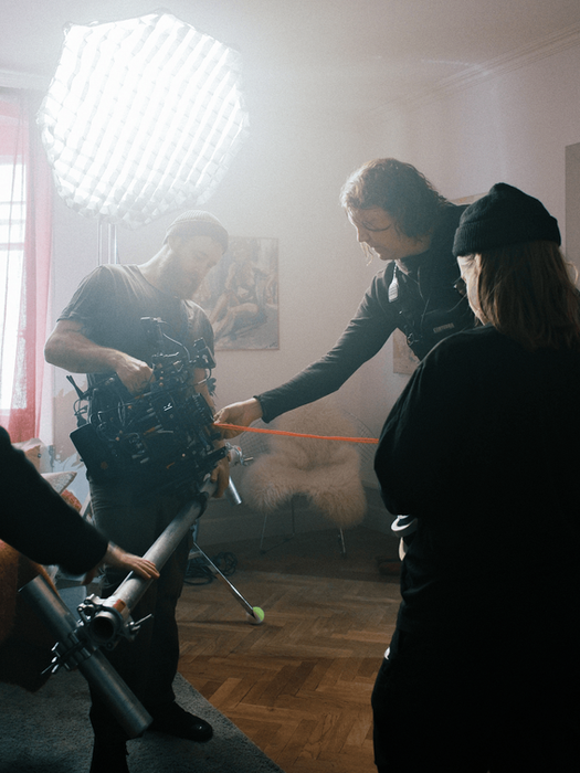 NewNew Creating force - Film crew setting up lighting equipment