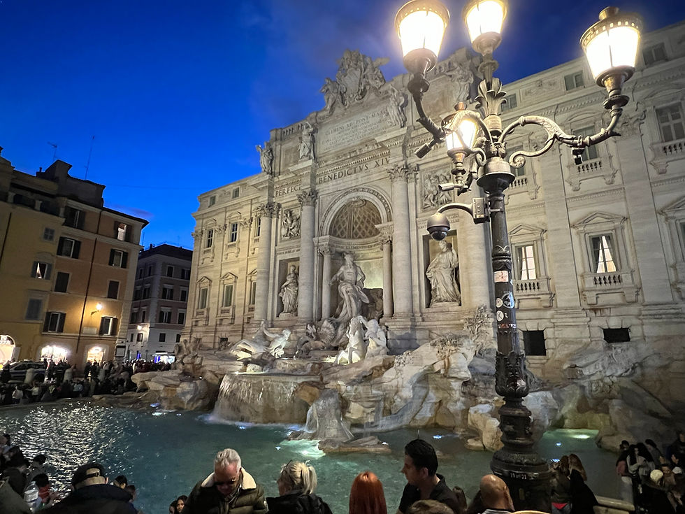 Three coins tossed into the Trevi Fountain