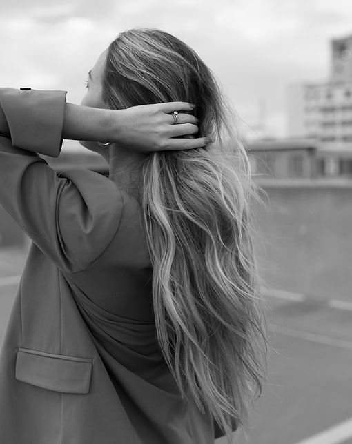 woman runing hand through her hair