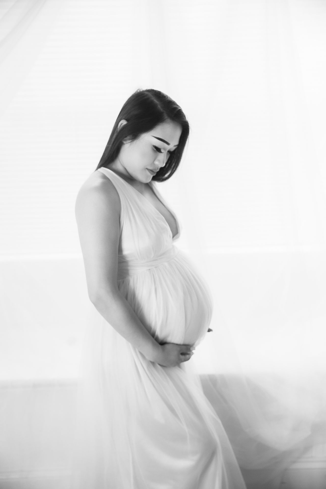 Indoor maternity session with side profile