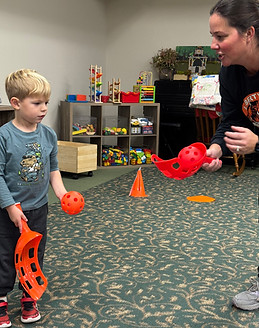 Preschool students participating in a hands-on classroom activity.