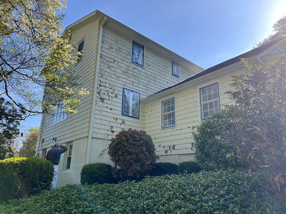 Connecticut Painters United crew hard at work in Portland, CT — meticulously prepping this home for a premium exterior repaint using top-tier products and professional spray application.