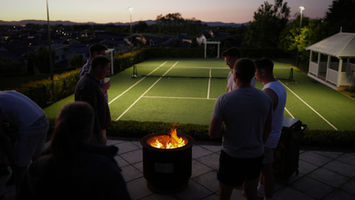 Smokeless Fire Pit NZ - being enjoyed for warmth and heat