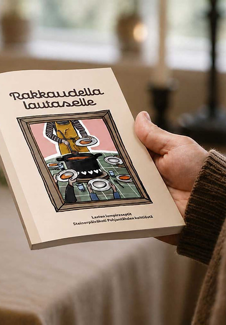 Rakkaudella lautaselle -reseptikirjan kansi ja kuvitus.