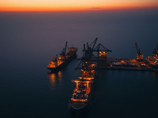 International tanker port, vessels stationary in open water beyond idle berths