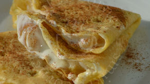 Millet pancakes made with oat milk, served warm with apple compote, yoghurt and cinnamon