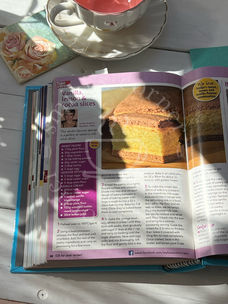 Honey Lemon Vanilla Cake, cocoa layers, lemon vanilla cream and soft sponge.