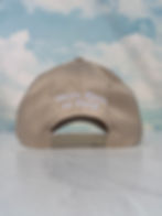 Thumbnail: back of khaki hat with We're Here to Help show name