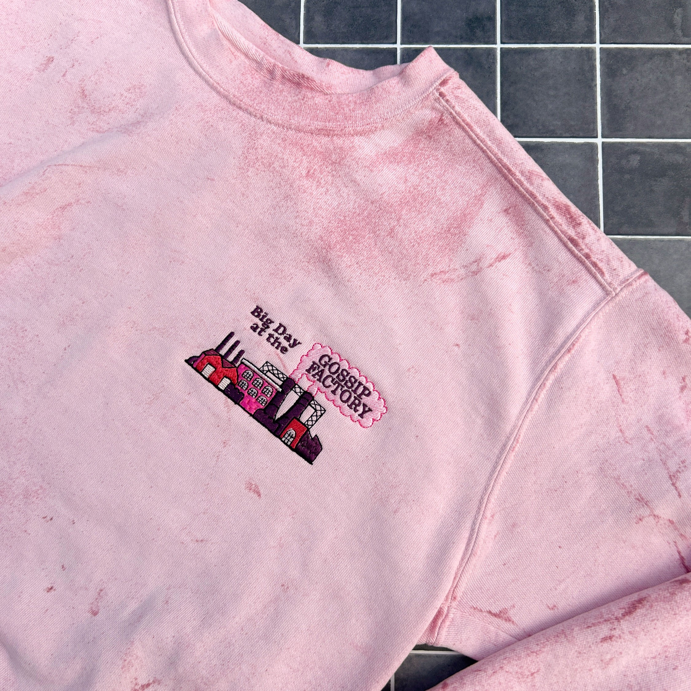 Pink tie dyed sweatshirt with factory embroidery on left chest