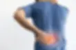 close-up-man-having-back-pain-and-lumbago.webp
