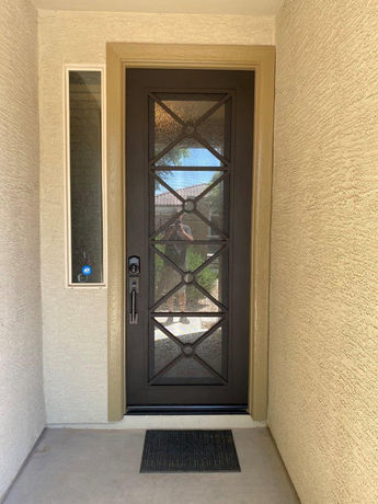 Austen modern iron mini grand entry door with three “X” geometric design