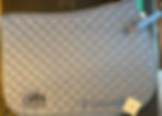 Quilted grey saddle pad with Six Birds Tack logo