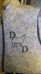 Custom logo apparel: grey speckled vest with D-sheep-D design