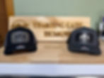 Two logo caps from Starting Gate Designs