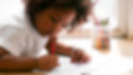 Young-girl-drawing-with-coloured-pencils-in-a-Montessori-classroom