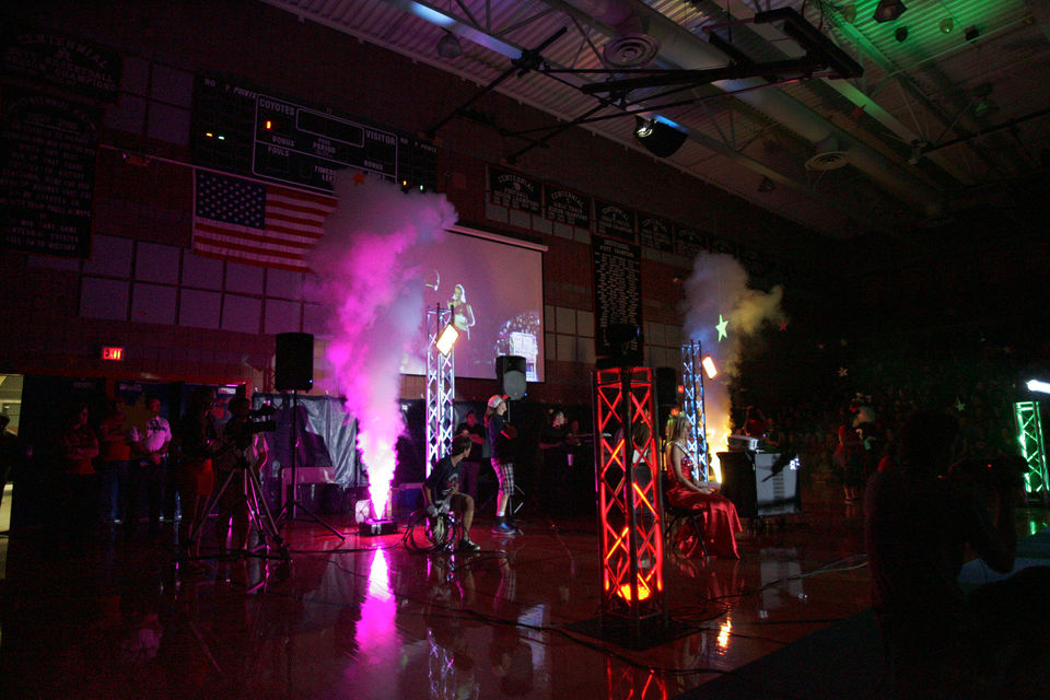 Blacklight high school assembly with lighting and sound with truss and effects