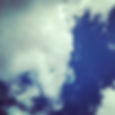 Picture of a blue sky with white puffy clouds