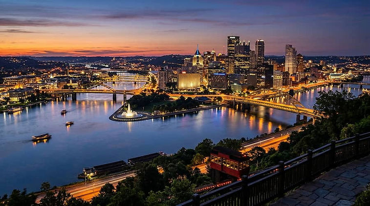 Pittsburgh skyline at night with Duquesne Incline and city lights
