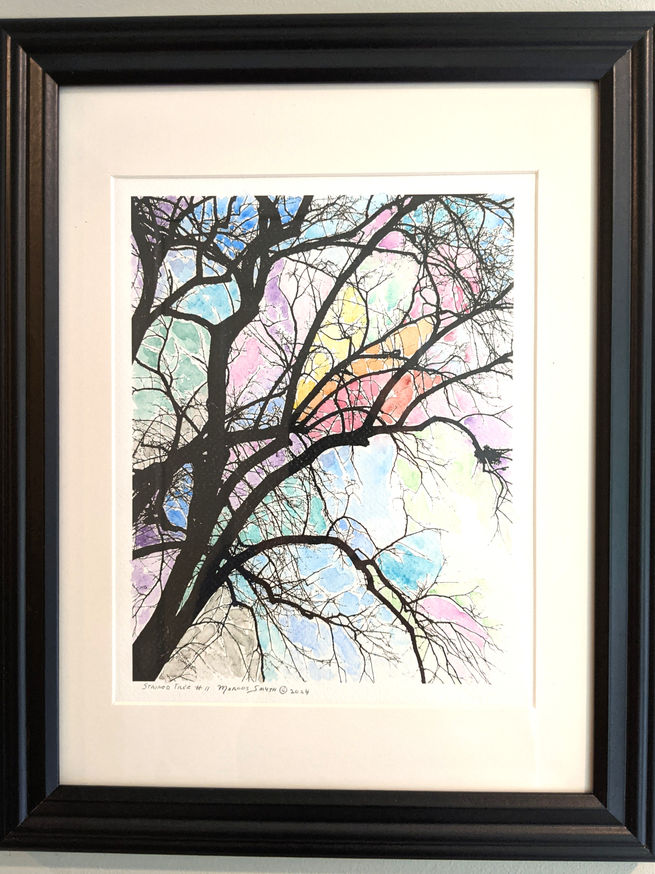 Tree silhouette hand water colored, with frame.