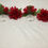 Thumbnail: Red floral napkin rings.