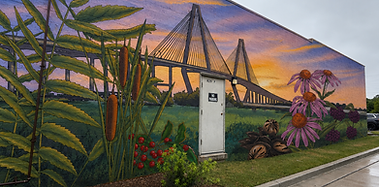 A mock up mural of the Charleston Ravenel Bridge and foliage.