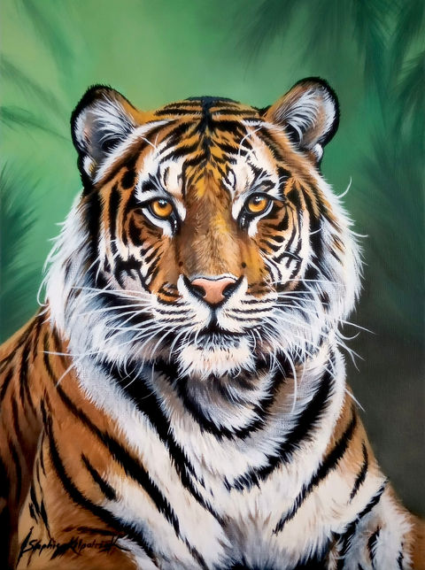 Tiger against natural green background