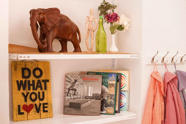 Shelf with works of art.