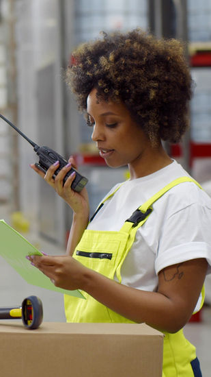 Warehouse Worker with Walkie Talkie