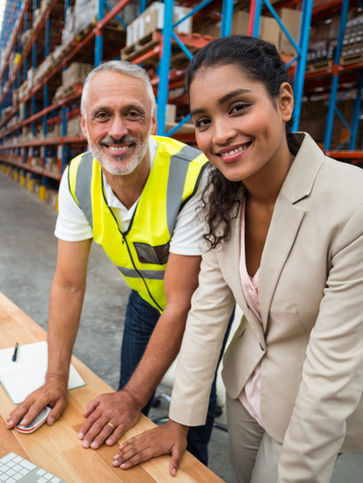 Workers at Warehouse Computer