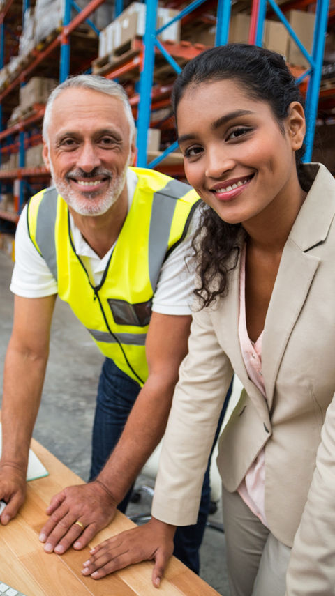 Workers at Warehouse Computer