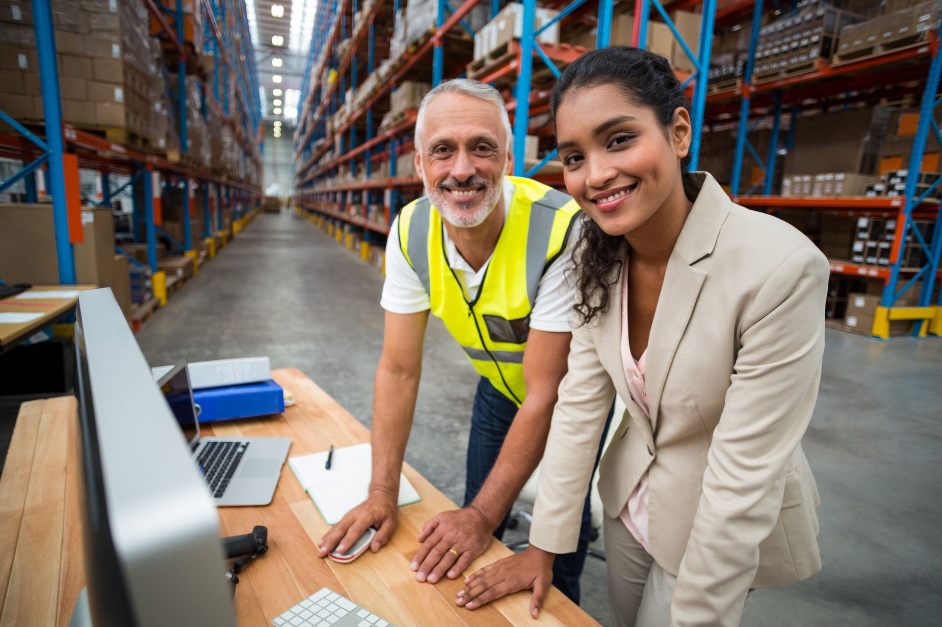 Workers at Warehouse Computer